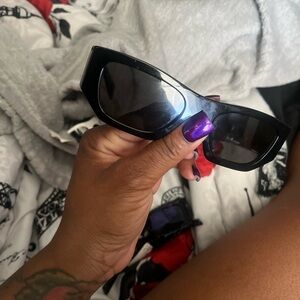 Woman’s Prada glasses